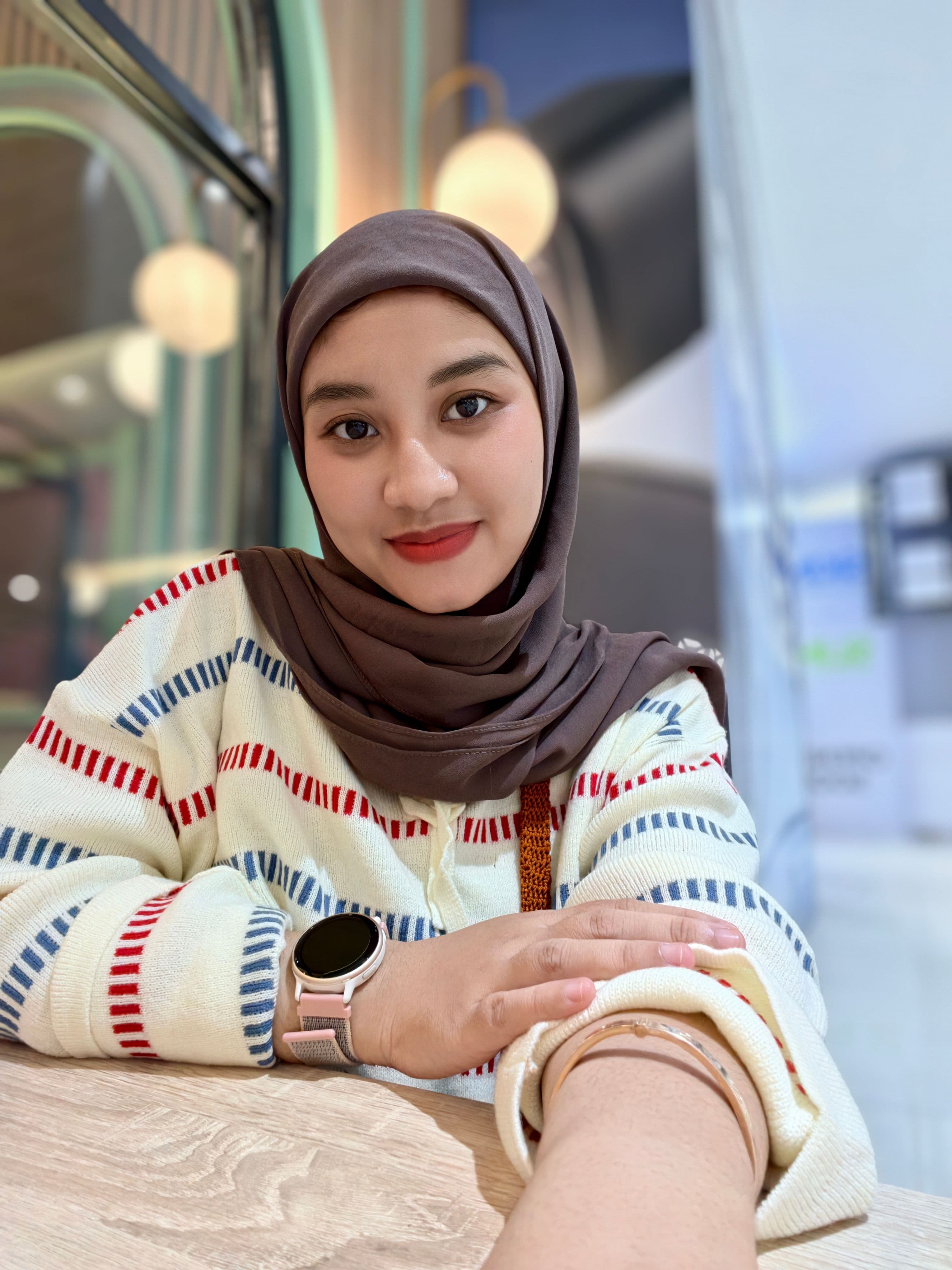 Rina Wahyuni, S.Psi